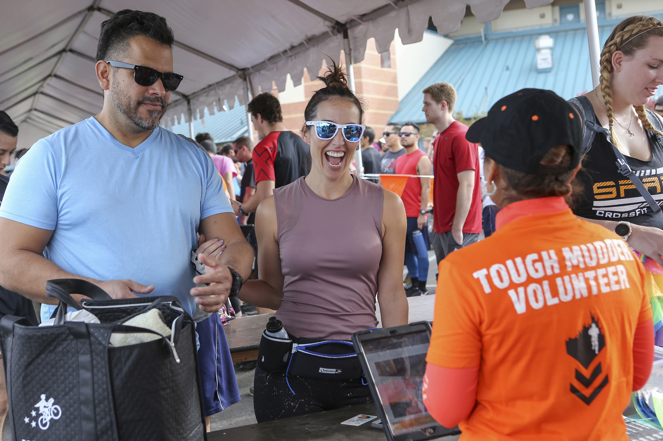 Volunteers welcoming the participants in registration